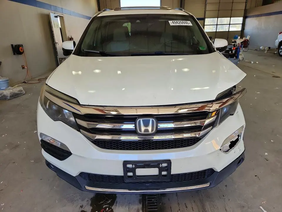 HONDA PILOT 2016 VIN 5FNYF6H99GB124528