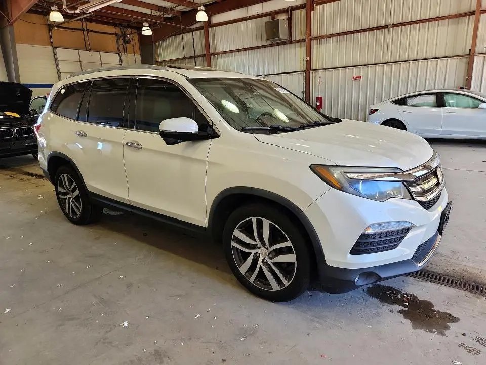 HONDA PILOT 2016 VIN 5FNYF6H99GB124528