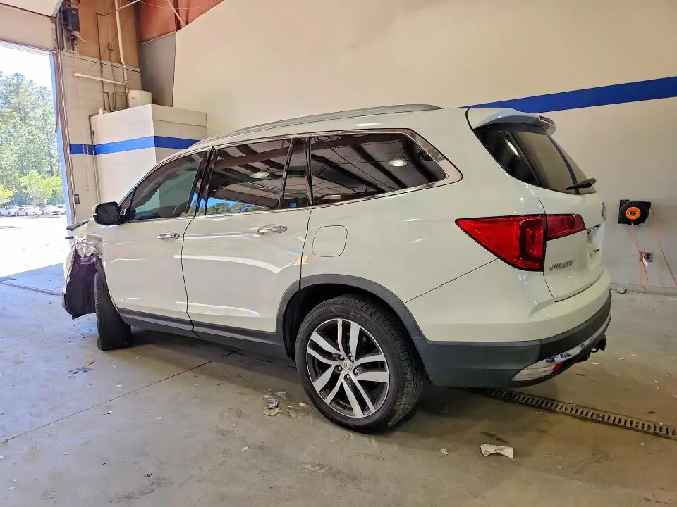 HONDA PILOT 2016 VIN 5FNYF6H99GB124528